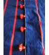 Plaid en coton bleu marine et pompons orange